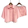 Women's pink short-sleeved top and shorts pajamas set